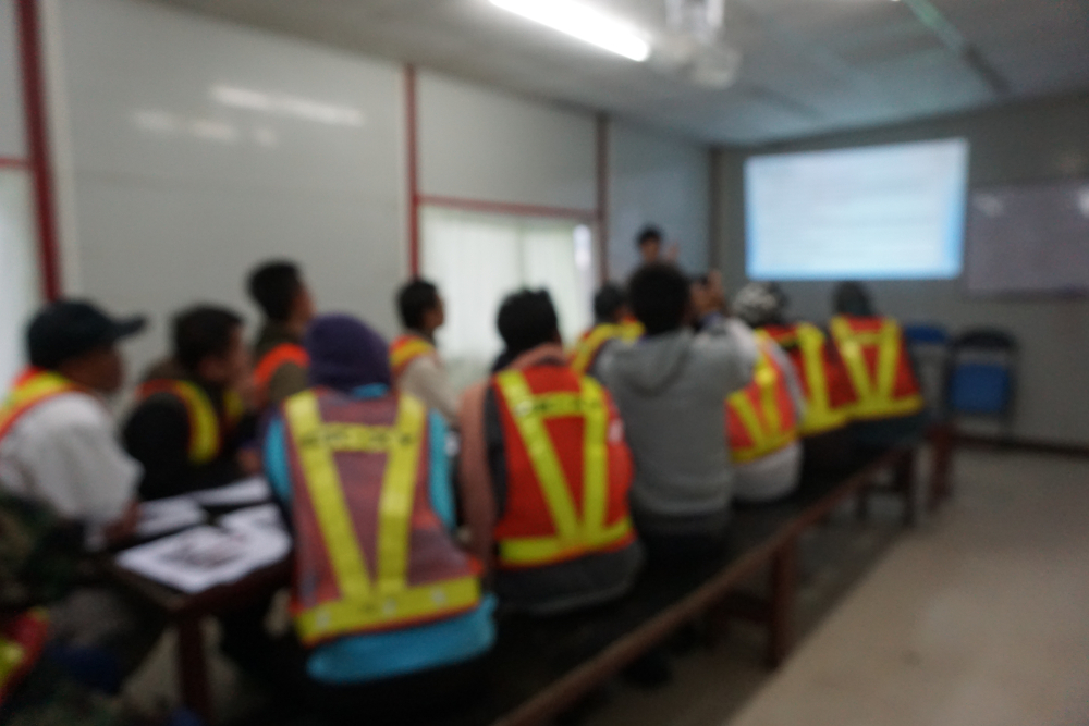 Instructor leading an on-site safety training session